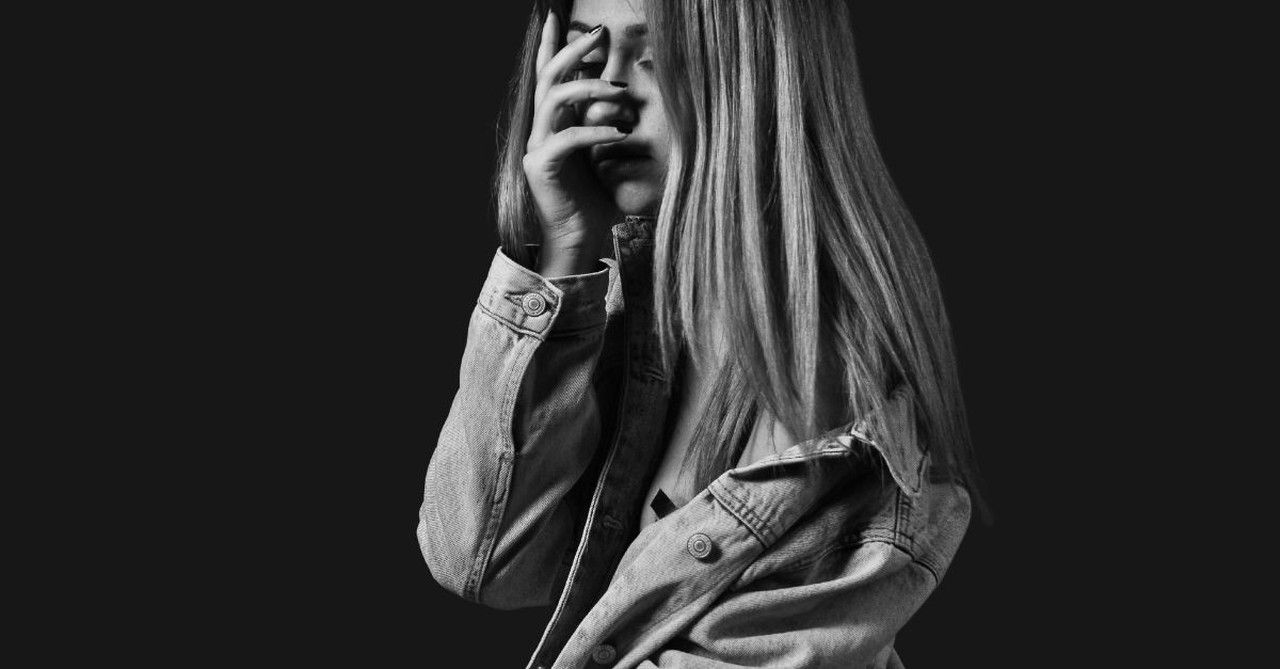 Sad woman; unforgiveness; struggle to forgive.