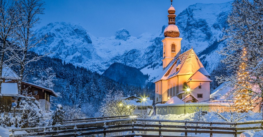 church in the mountains with lights; christmas prayer praise